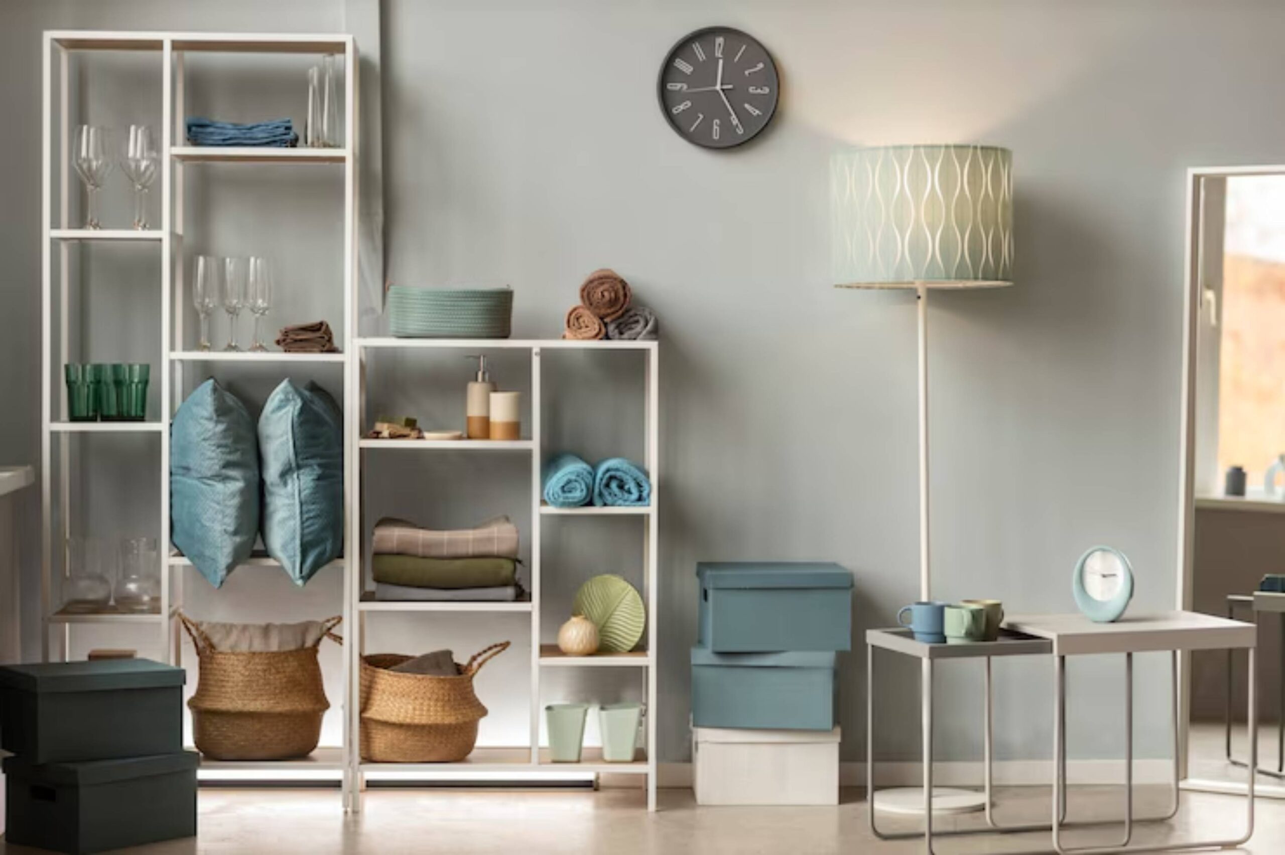Modern organized living space with shelves, storage boxes, and decorative items